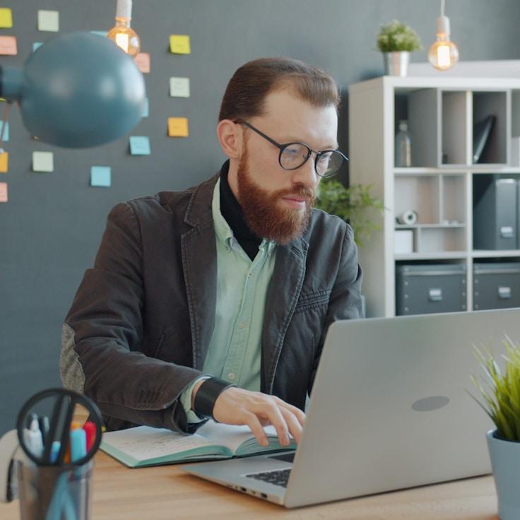 Mobile app project planning workspace with devices and development tools